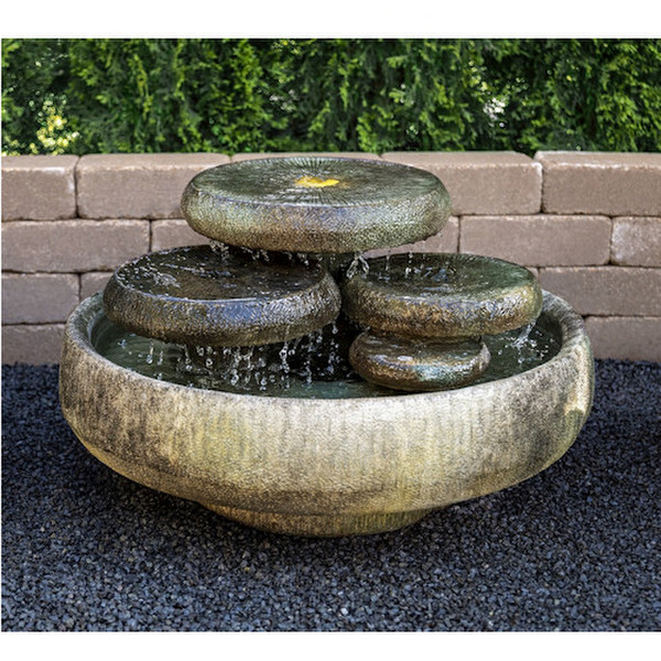 Water Lilies Fountain features shimmering pools of water Retro Modern